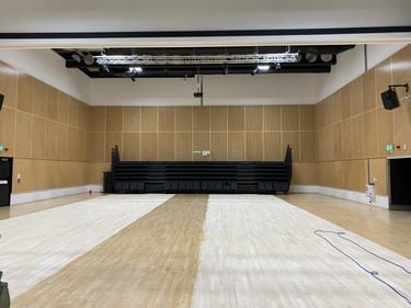 School hall floor, half sanded